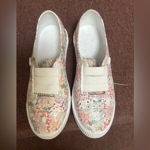 These are floral slip-on sneakers brand Blowfish Malibu crocs material